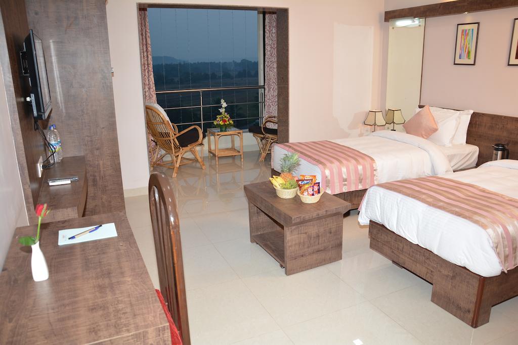Boshan Hotels Mapusa Habitación foto