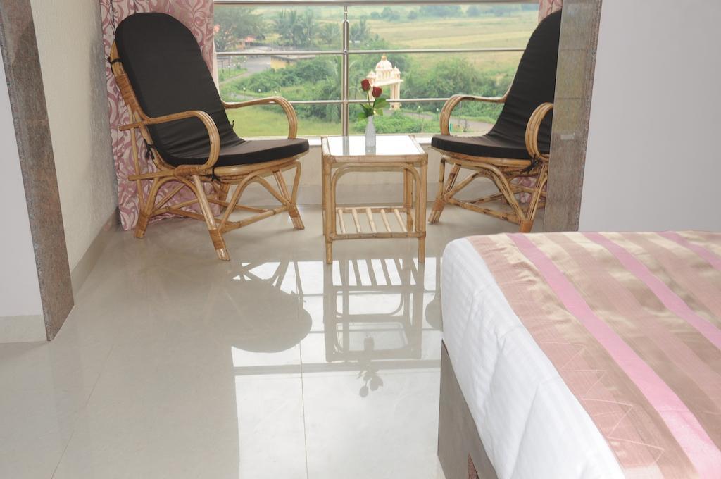 Boshan Hotels Mapusa Habitación foto