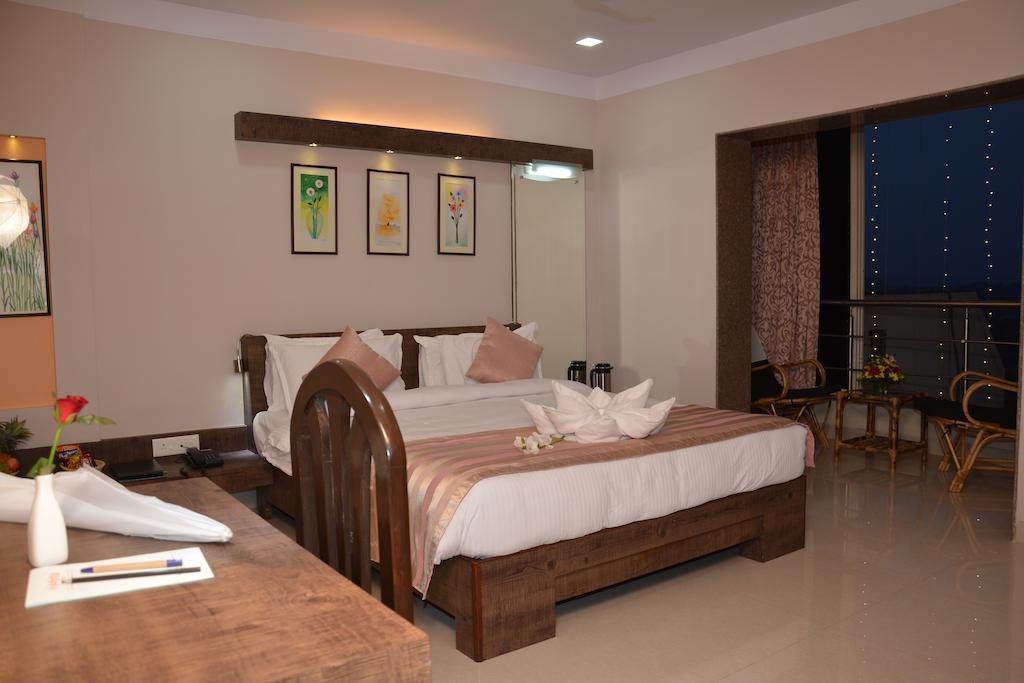 Boshan Hotels Mapusa Habitación foto
